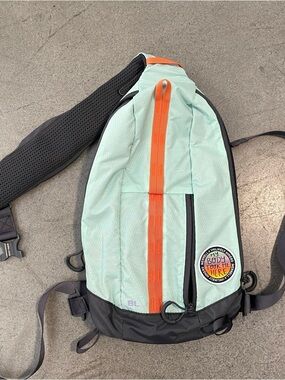 Merrell Mint & Orange Sling Pack with Black Trim
